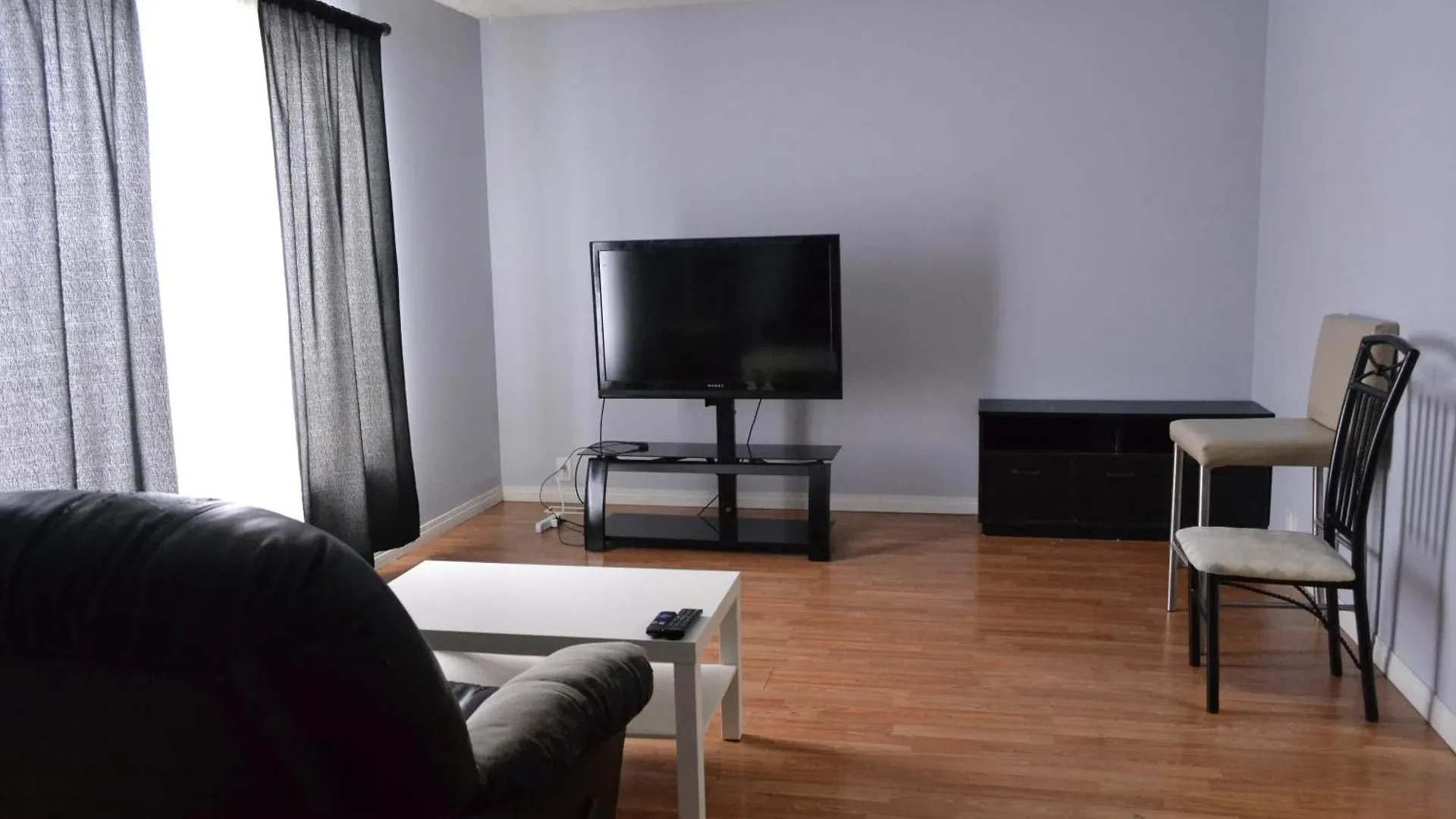 Private Bedroom On The Main Floor With Shared Washroom - Erin Woods Calgary Canada